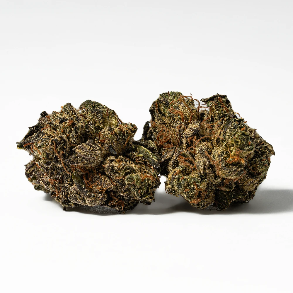 Grizzly Pink is a potent indica-dominant hybrid known for its high THC levels, dense frosty buds, and a bold mix of sweet, gassy, and earthy aromas. It delivers a quick euphoric lift followed by deep full-body relaxation and heavy sedation, making it ideal for nighttime use.