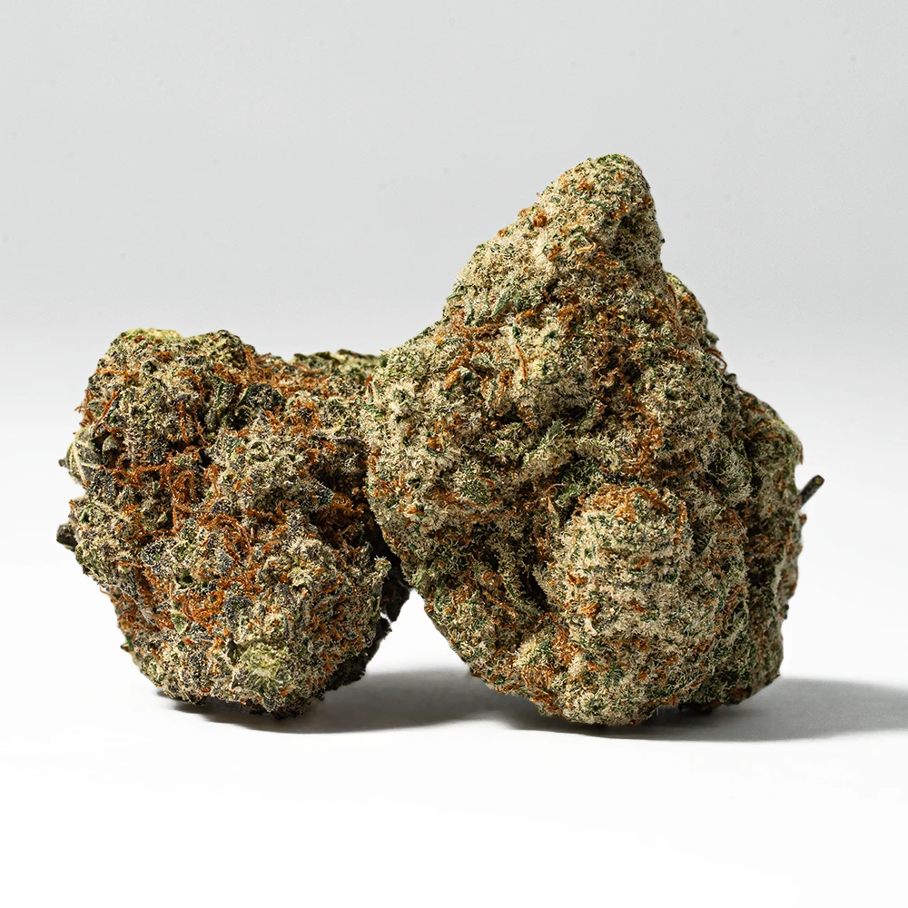 Wedding Cake is, sometimes called Pink Cookies, a hybrid with indica-dominance. It is attained by crossing Triangle Kush and Animal Mints. It gives an exceptionally sweet aromatic essence and a fruity flavor. The taste is a perfect combination of sweetness of cookies and fruitiness of a cherry pie.